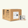 The 100 count box of Numi Honeybush tea bags on a cream background